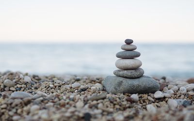 Balanced stones on a pebble beach