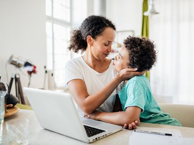 Single Mom Being Affectionate With Young Son