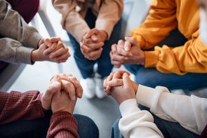 people in a support grou