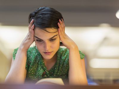person having a hard time reading