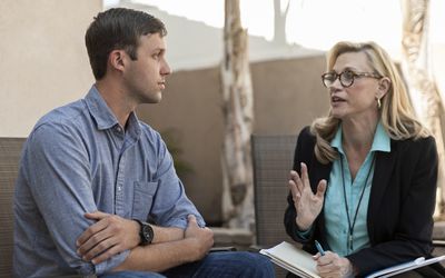 Man talking with therapist in therapy