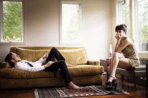 Unhappy couple in living room 