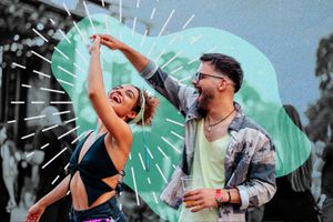 extroverted couple having a good time together at a party
